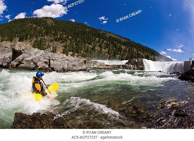 A kayaker playboating on the Kootenai River, MT