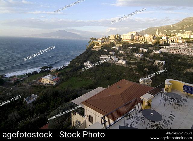 Looking towards the town of Vico Equense at sunset, with Mount Vesuvius in the background, near Sorrento, Italy | NONE |