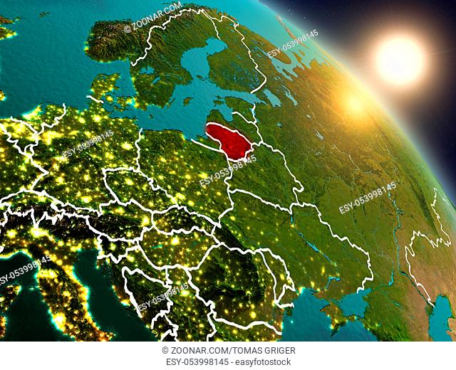 Sunset above Lithuania from space on planet Earth with visible country borders. 3D illustration. Elements of this image furnished by NASA