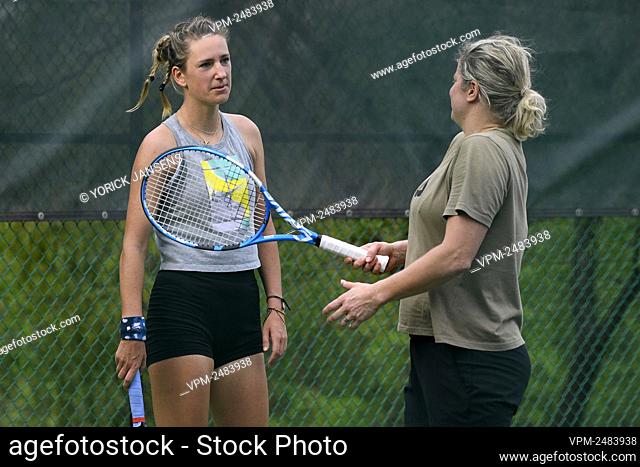 Belorussian Victoria Azarenka and Belgian Kim Clijsters pictured during a training session on the first day of the 'WTA Monterrey' tennis tournament in...