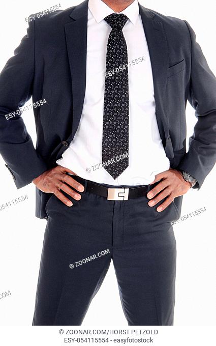 A close up image of the middle section on a tall handsome African American man in suit and tie, isolated for white background