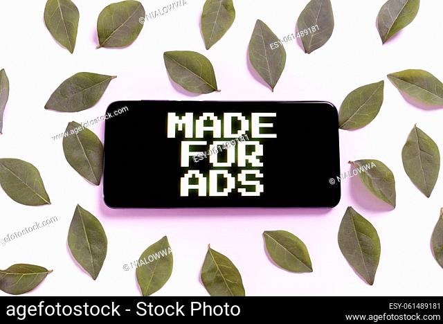 Text showing inspiration Made For Ads, Business concept Marketing strategies designs for a campaign promotionals Smartphone Surrounded And Leaves Presenting...