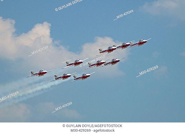 Canadian forces Snowbirds flying CT-114 Tutor during airshow. Bagotville military base, Quebec, Canada