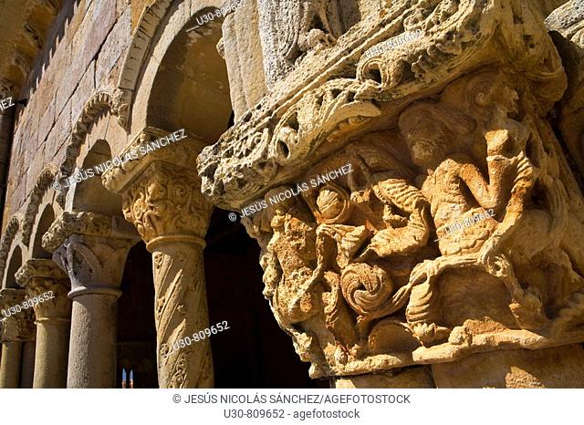 Capitals and columns carved with bas of the romanesque church porticoed of San Juan y Santa Basílica; in Rebolledo de la Torre, in northern Burgos