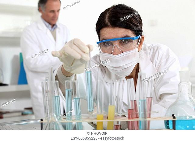 Scientists conducting an experiment