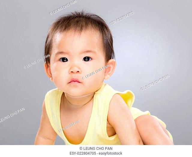 Serious asian baby girl