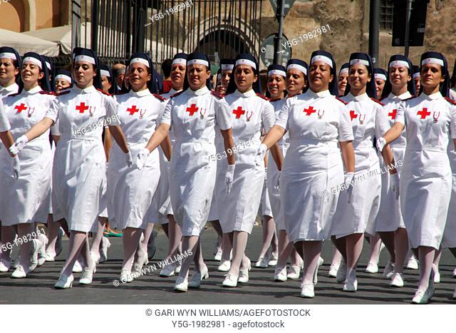 2nd June 2013 - Red Cross nurses marching past the Theatre of Marcellus at the Italian Republic Day parade in rome italy