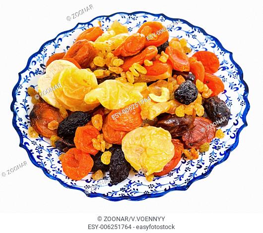 dried sweet fruits on arabic plate
