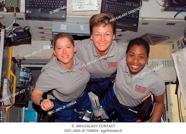 Astronauts Pam Melroy (left), STS-120 commander; Peggy Whitson, Expedition 16 commander; and Stephanie Wilson, STS-120 mission specialist