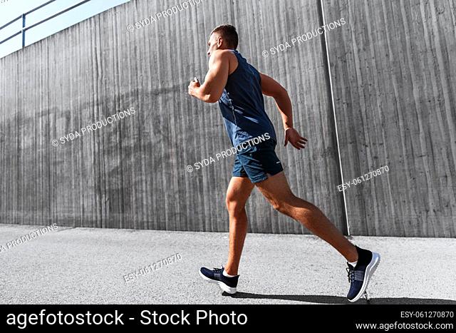 young man running outdoors