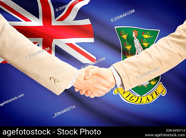 Businessmen shaking hands with flag on background - British Virgin Islands
