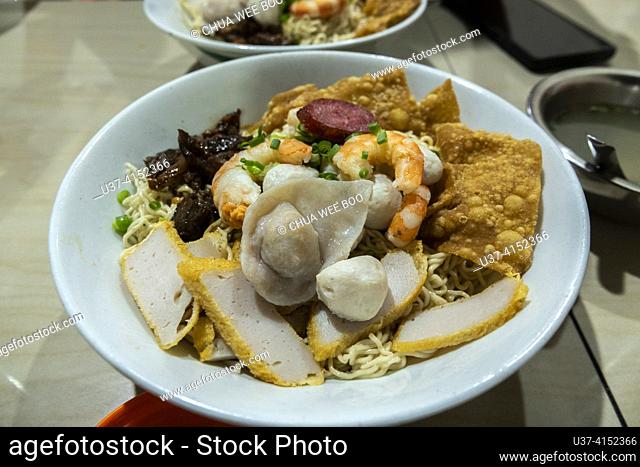 Bak Mie sold in Pontianak, West Kalimantan, Indonesia  Bak mie in Pontianak is an Indonesian noodle dish similar to lo mein