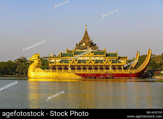 Karaweik restaurant, the golden dragon boat, on Kandawgyi Lake, is a reproduction of a royal barge, Yangon, Myanmar, Asia