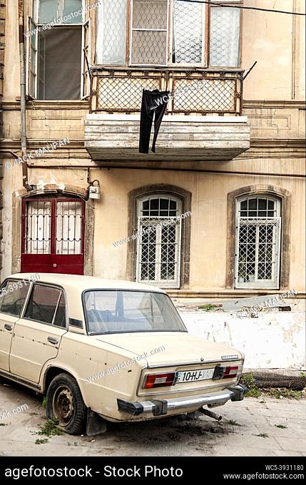 baku city old town street view in azerbaijan with vintage old soviet car