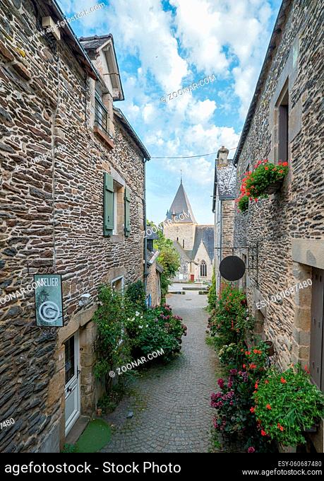 Rochefort-en-Terre, Morbihan / France - 24 August, 2019: narrow alley in the historic old town of Rochefort-en-Terre in Brittany