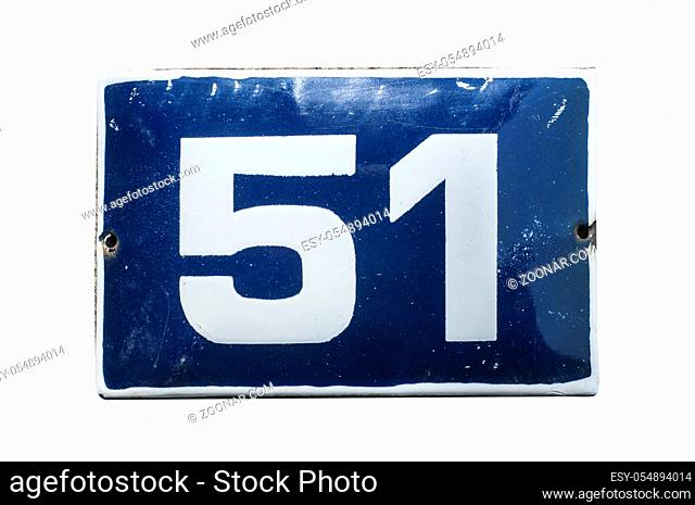 Weathered grunge square metal enameled plate of number of street address with number 51 closeup isolated on white background