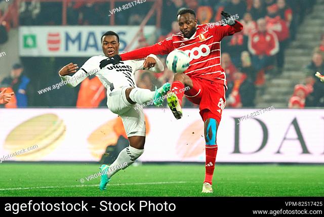 Charleroi's Ken Nkuba Tshiend and Standard's Merveille Bope Bokadi fight for the ball during a soccer match between Standard de Liege and Sporting Charleroi