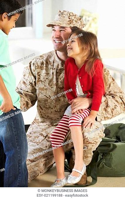 Children Greeting Military Father Home On Leave