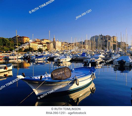 View across harbour to town and citadel, Calvi, Corsica, France, Europe