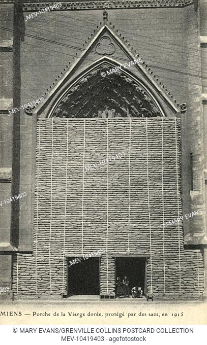 Sandbags almost completely filling one of the old entrances to Amiens Cathdral in anticipation of German attack during World War One