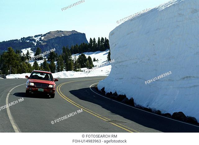 Crater Lake National Park, OR, Oregon, Cascade Range, Volcanic Legacy Scenic Byway, Rim Drive, side of road packed high with snow