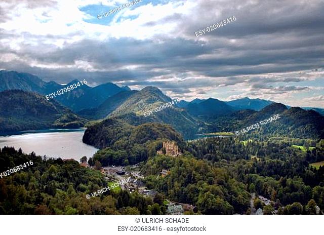 Castle Hohenschwangau with alps in the background