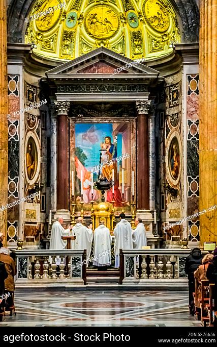 ROME - AUGUST 1: Indoor St. Peter's Basilica on August 1, 2012 in Rome, Italy. St. Peter's Basilica until recently was considered largest Christian church in...