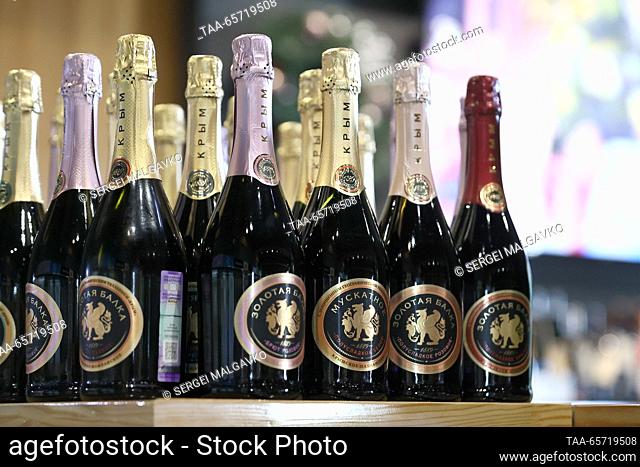 RUSSIA, SEVASTOPOL - DECEMBER 13, 2023: Bottles of sparkling wines on display in the brand shop at the Shampaneria vinyard run by the Zolotaya Balka company