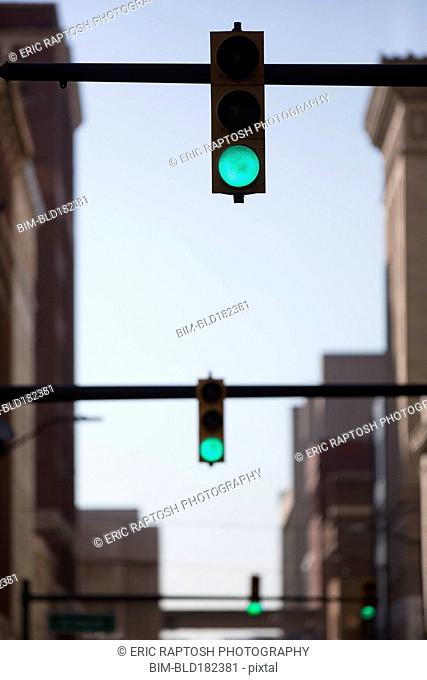 Green lights over city street