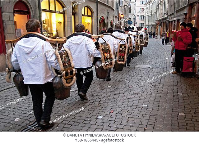 Parade of men with traditional Swiss cow bells, Escalade - annual festival held in December celabrating historical victory over French attack for Geneva at...