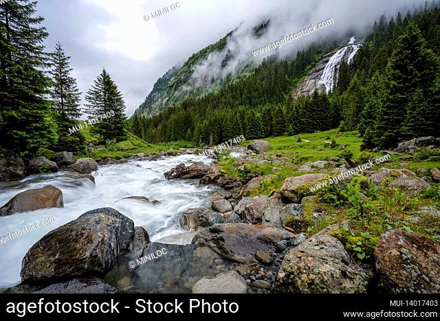 mountain blue water river and trees landscape natural environment. hiking in the alps. grawa waterfall in stubai valley, tyrol, austria