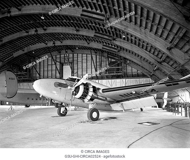 Airplanes in Airport Hangar, Morristown, New Jersey, USA, Gottscho-Schleisner Collection, April 1952