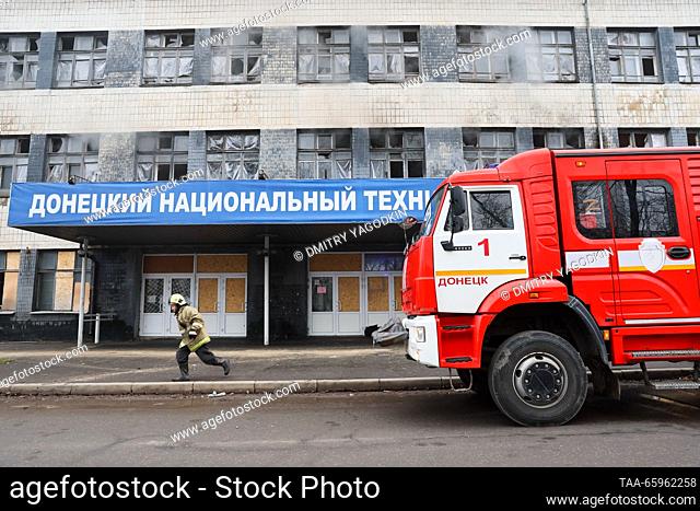 RUSSIA, DONETSK - DECEMBER 21, 2023: Smoke billows from Building 3 of the Donetsk National Technical University after a military strike