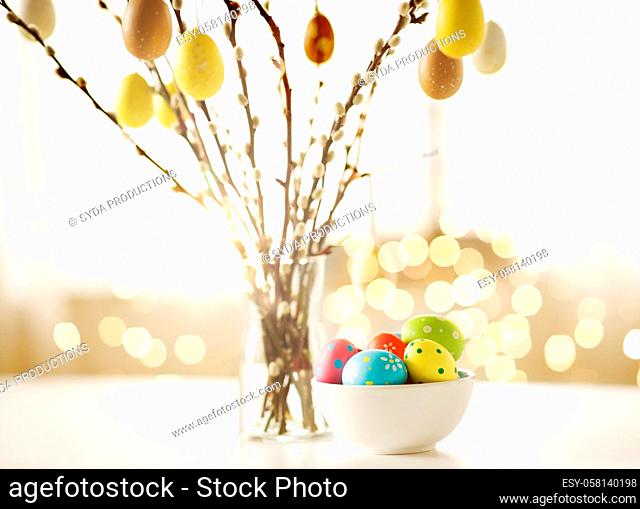 pussy willow branches decorated by easter eggs