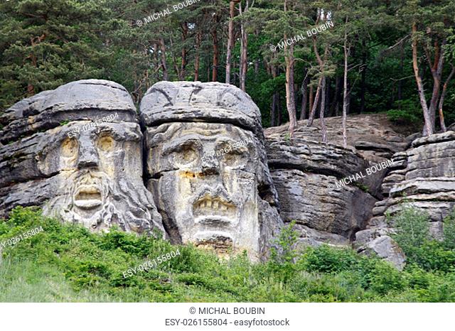 Heads of Devils are about 9 m high rock sculptures of giant heads carved into the sandstone cliffs in the pine forest above the village Zelizy in the district...