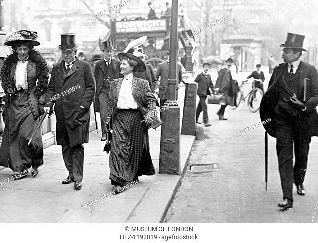 Two suffragettes with Herbert Asquith, c1910. Asquith, the Liberal prime minister, had blocked attempts to grant women the vote