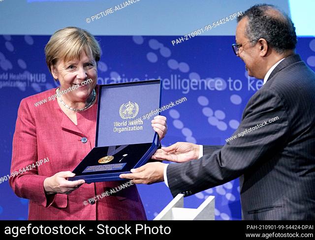 01 September 2021, Berlin: German Chancellor Angela Merkel (CDU) receives the ""WHO Global Leadership Award"" from Tedros Adhanom Ghebreyesus