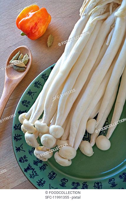 Asian Shimeji mushrooms, cardamom pods and a chilli