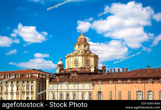 TURIN, ITALY - CIRCA AUGUST 2020: perspective on the elegant and Baroque Saint Lawrence church in Turin. Amazing natural light with a blue sky