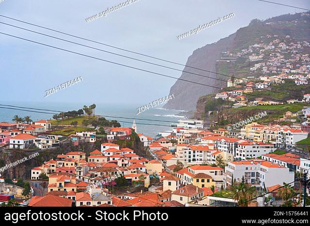 View of Câmara de Lobos in Madeira with Cape Girao on the background
