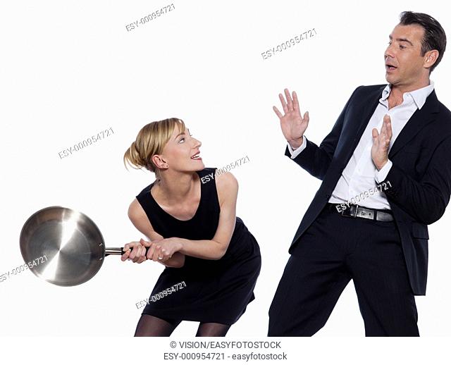 beautiful caucasian couple on studio white background in funny conflict