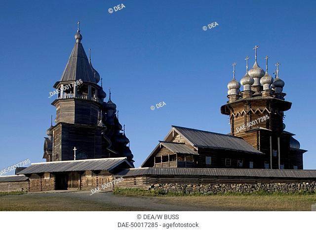 Russia - Karelia - Lake Onega - Kizhi Island - Kizhi Pogost (UNESCO World Heritage List, 1990). Wooden octagonal bell tower (1862) and Intercession Church...