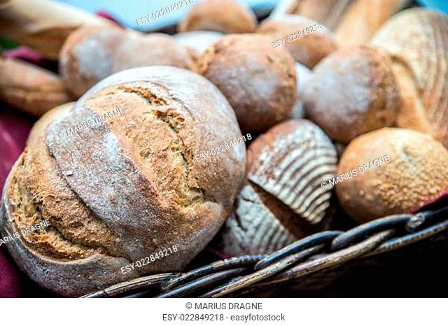 Delicious bread and rolls in basket
