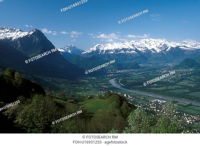 Alps, Liechtenstein, Europe, Scenic view of the snow-capped Alps, The Rhine River valley and Triesenberg in the country of Liechtenstein
