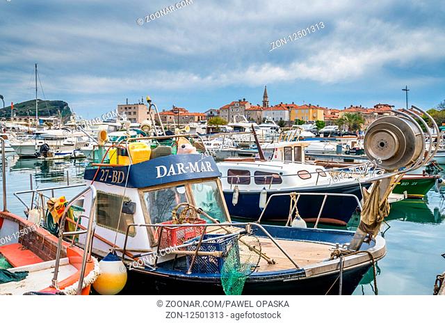 Budva, Montenegro - April 2018 : Old fisherman boat in the port