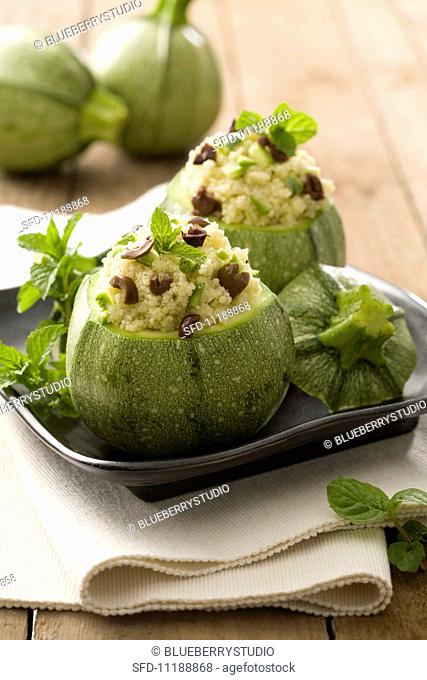 Round courgettes filled with couscous and olives