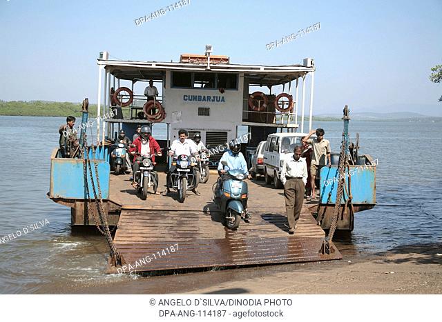 Two wheelers coming out of Ferry Boat coming from Chorao Island to Ribander , Goa , India