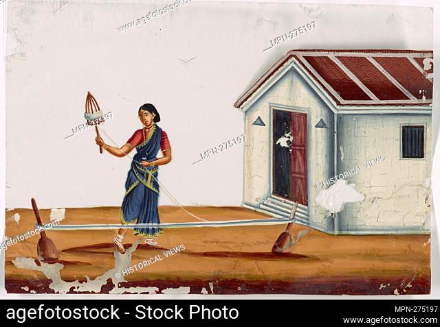 Female spinner in front of white building. Indian coloured drawings: a collection of 177 original paintings on ""talc, "" etc