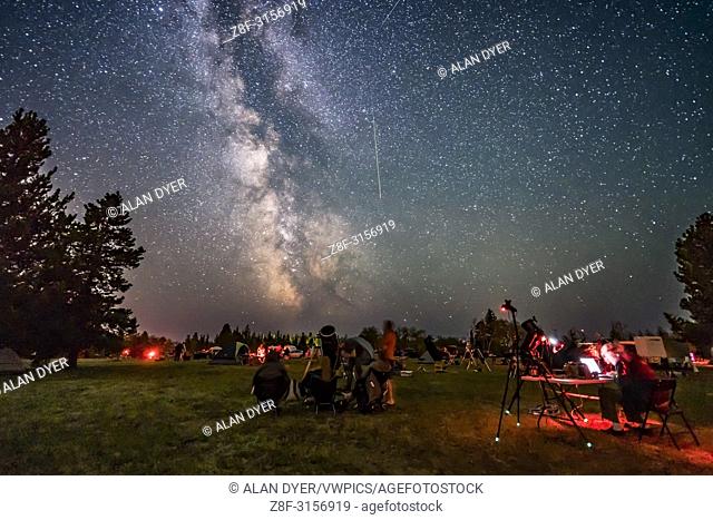 A Perseid meteor streaks down the Milky Way over the Saskatchewan Summer Star Party in the Cypress Hills of southwest Saskatchewan