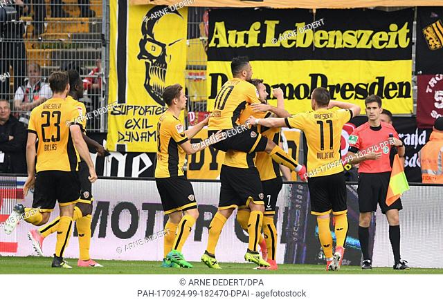 Dresden's Florian Ballas (L-R), Jannik Mueller, Aias Aosman, scorer Manuel Konrad, Niklas Kreutzer and Haris Duljevic cheer over the 1-0 score during the German...